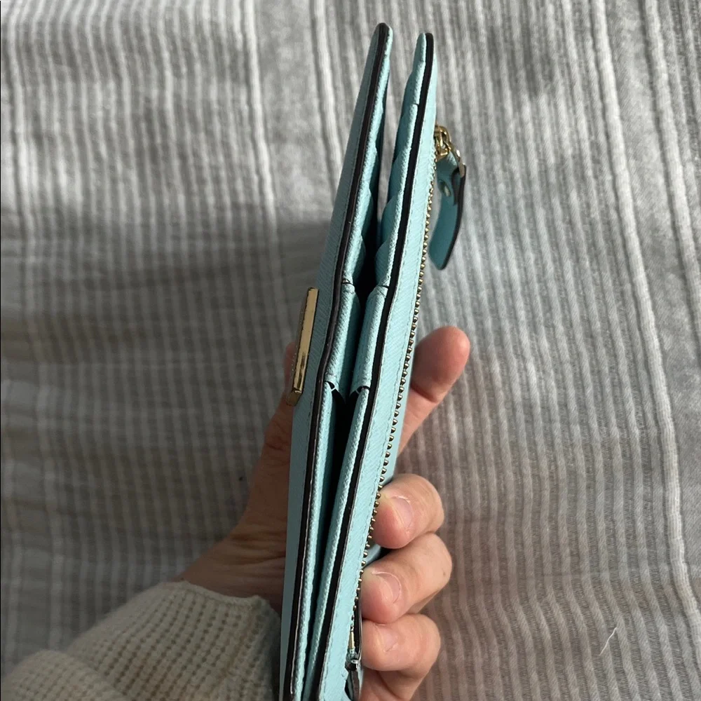 Kate Spade Light Blue Wristlet with Gold Detail